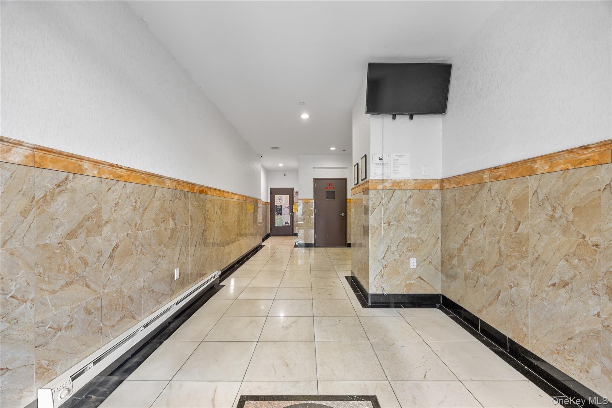 138-12 Northern Boulevard, Unit 5D Queens, NY 11354 - Photo 19 of 22 a view of entryway with stairs