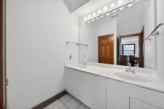 a bathroom with a toilet and a bathtub