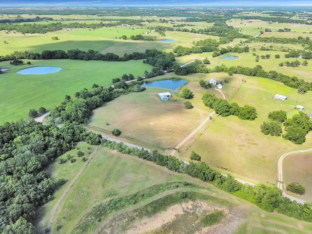 a view of a lake with a big yard