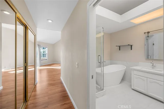 a bathroom with a bathtub sink and toilet