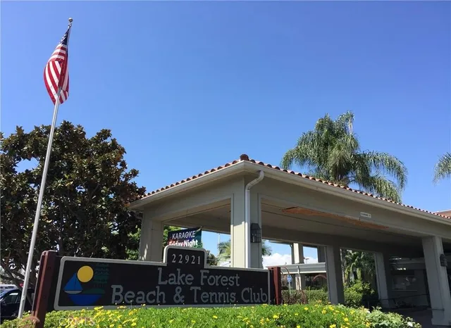 a front view of house with a garden
