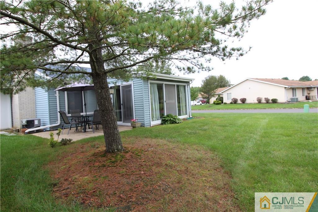 438 A Belford Road Monroe Township, NJ 08831 - Photo 17 of 19 a view of a yard with a house and large trees