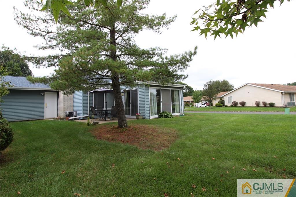 438 A Belford Road Monroe Township, NJ 08831 - Photo 18 of 19 a view of a house with backyard and sitting area