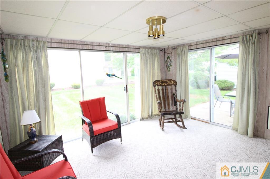 438 A Belford Road Monroe Township, NJ 08831 - Photo 7 of 19 a view of a livingroom with furniture and a window