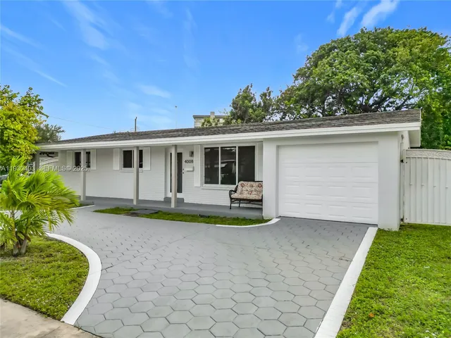 front view of a house with a patio