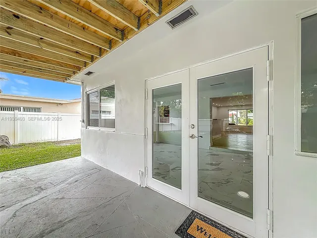 a view of a backyard of the house