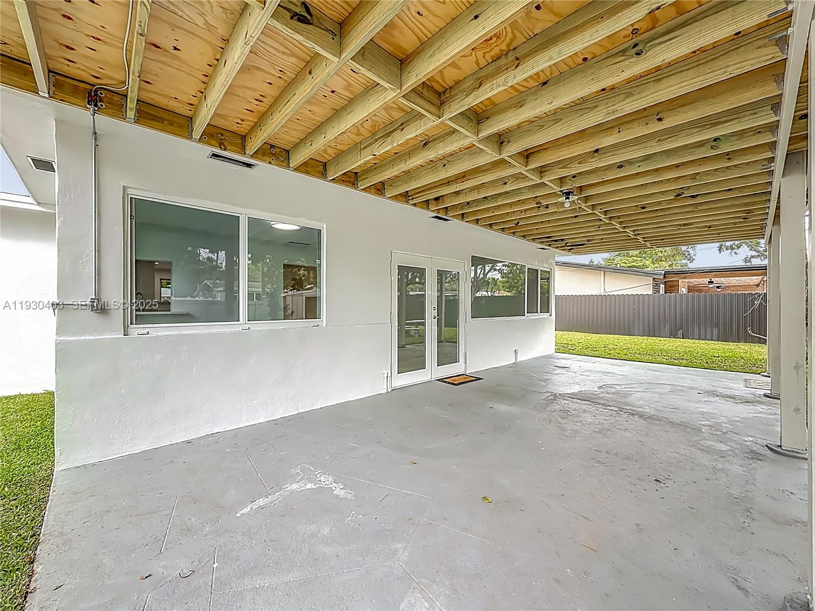 4008 Adams Street Hollywood, FL 33021 - Photo 39 of 54 a view of an empty room with a window