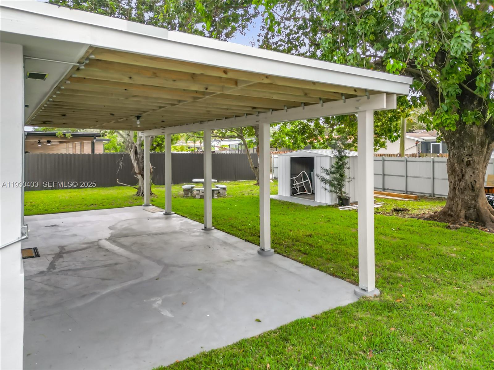 4008 Adams Street Hollywood, FL 33021 - Photo 44 of 54 a view of a house with backyard and porch