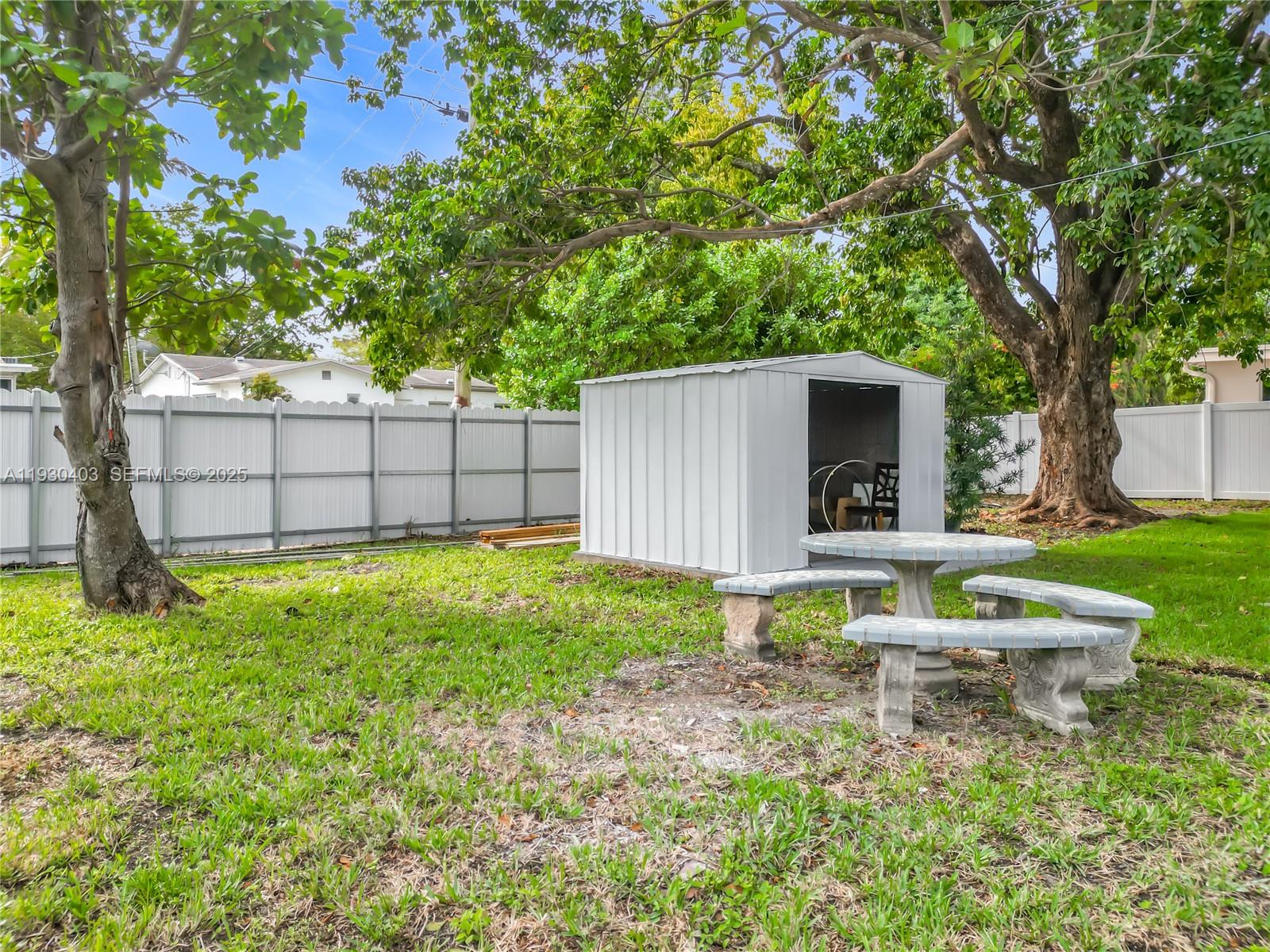 4008 Adams Street Hollywood, FL 33021 - Photo 50 of 54 a view of a backyard with a garden