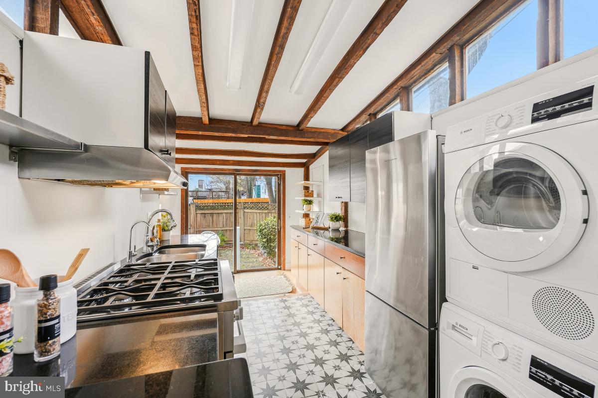 505 9th Street Southeast Washington, DC 20003 - Photo 13 of 30 a kitchen with a stove and a sink