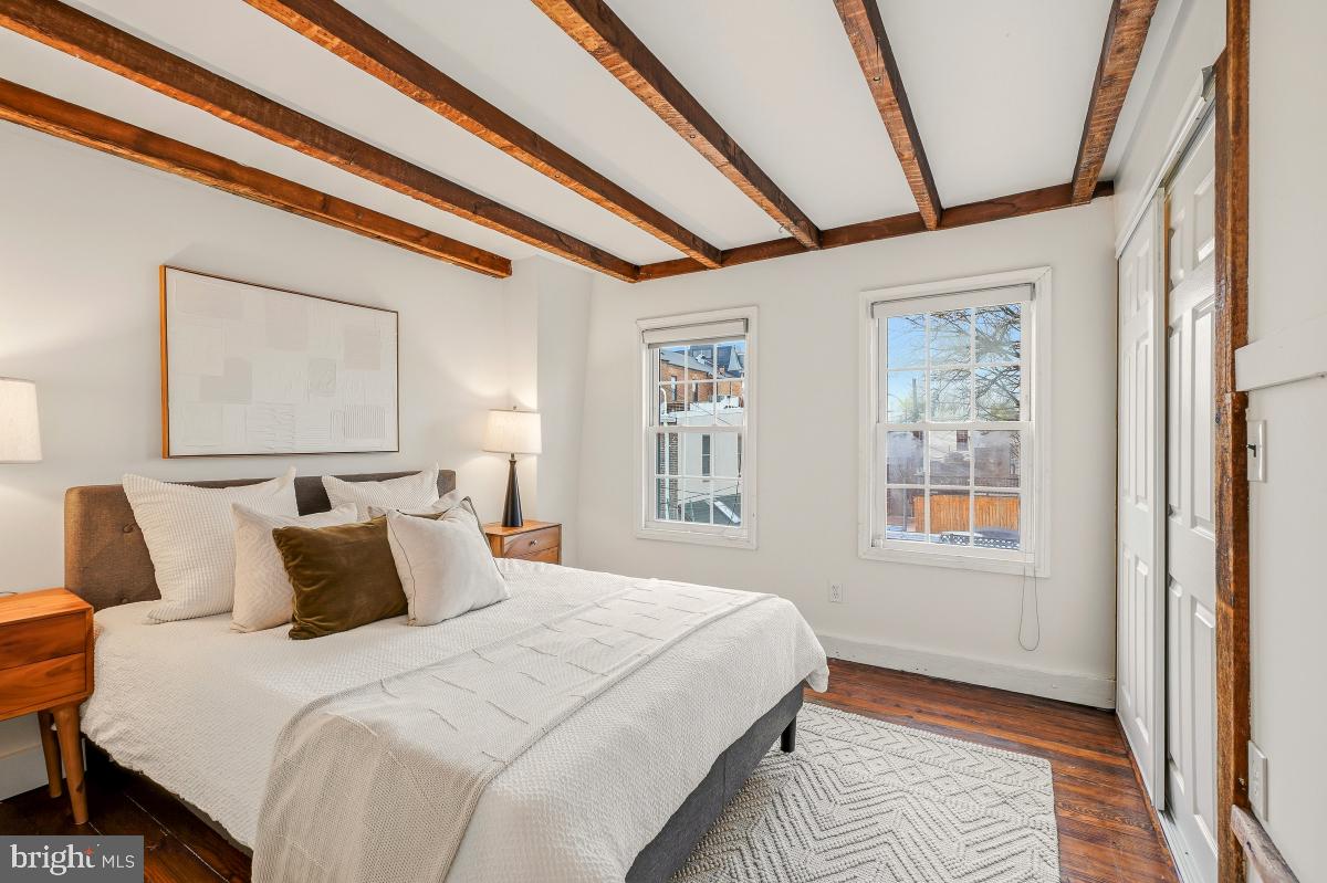 505 9th Street Southeast Washington, DC 20003 - Photo 21 of 30 a bedroom with a bed and a window