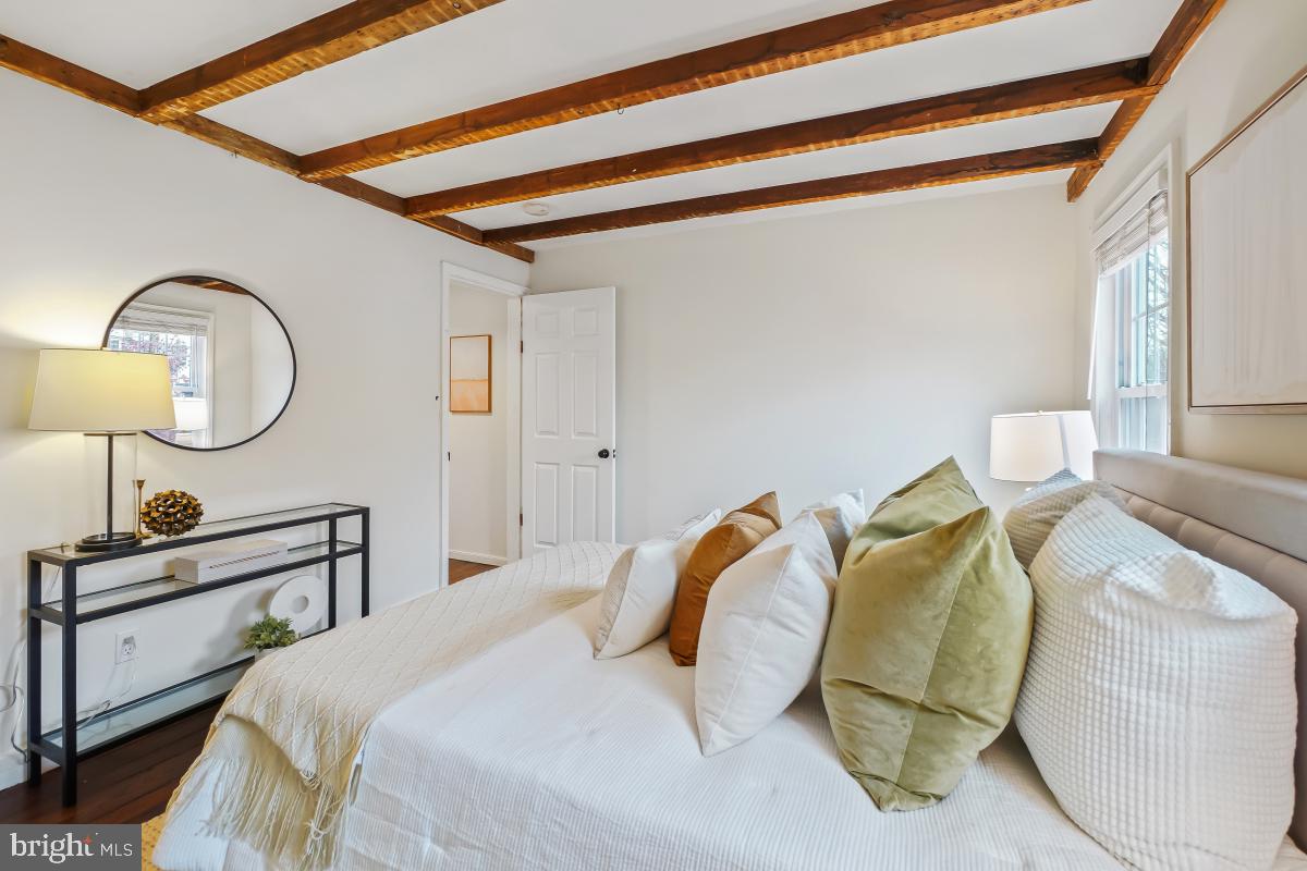 505 9th Street Southeast Washington, DC 20003 - Photo 24 of 30 a bedroom with furniture and a mirror