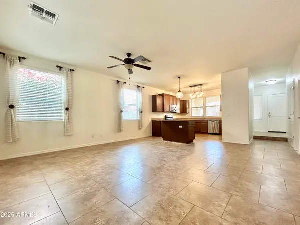 a large kitchen with cabinets and a kitchen