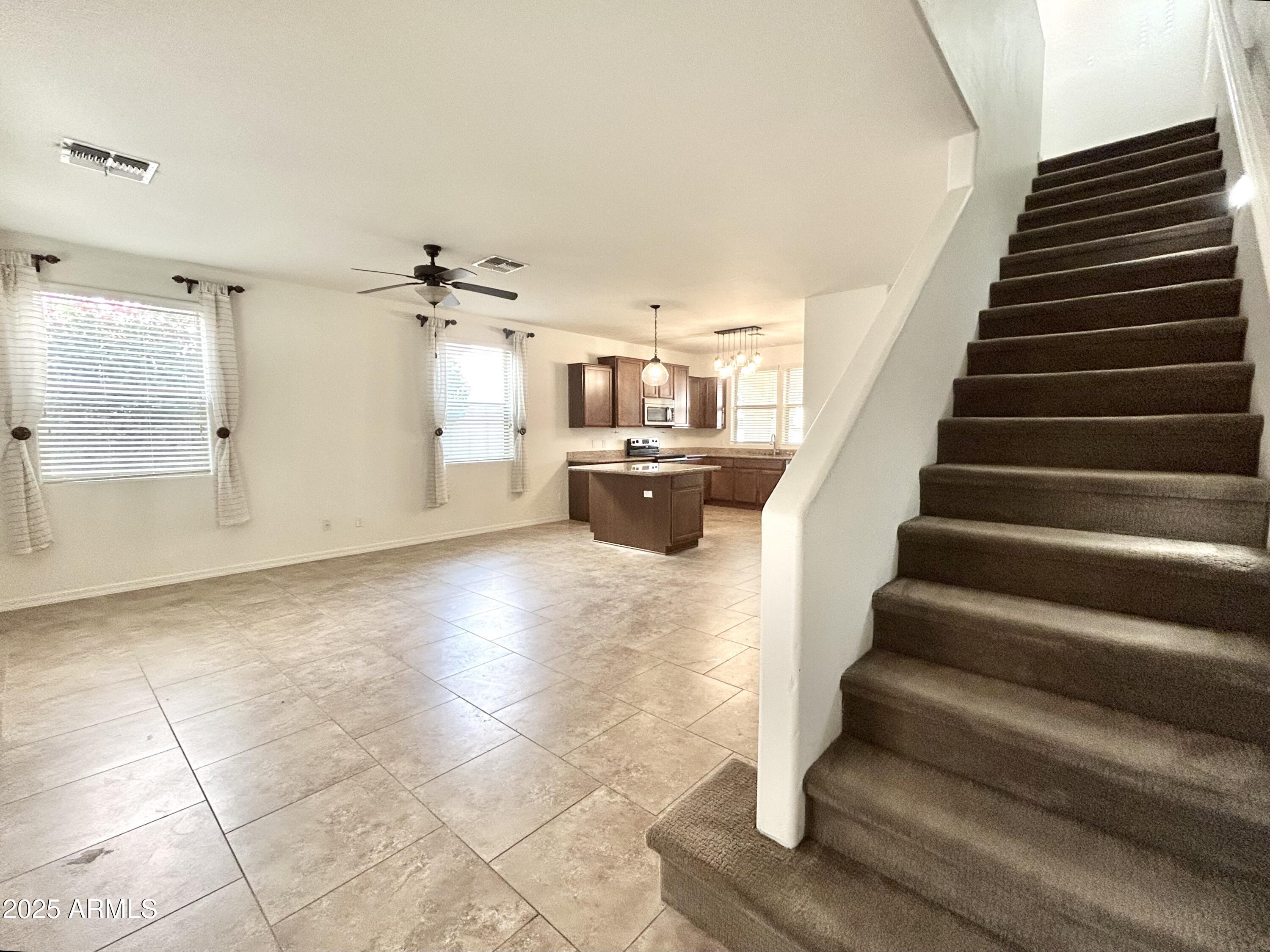 1418 South Jessica Lane Tempe, AZ 85281 - Photo 9 of 13 a view of entryway and hall with wooden floor