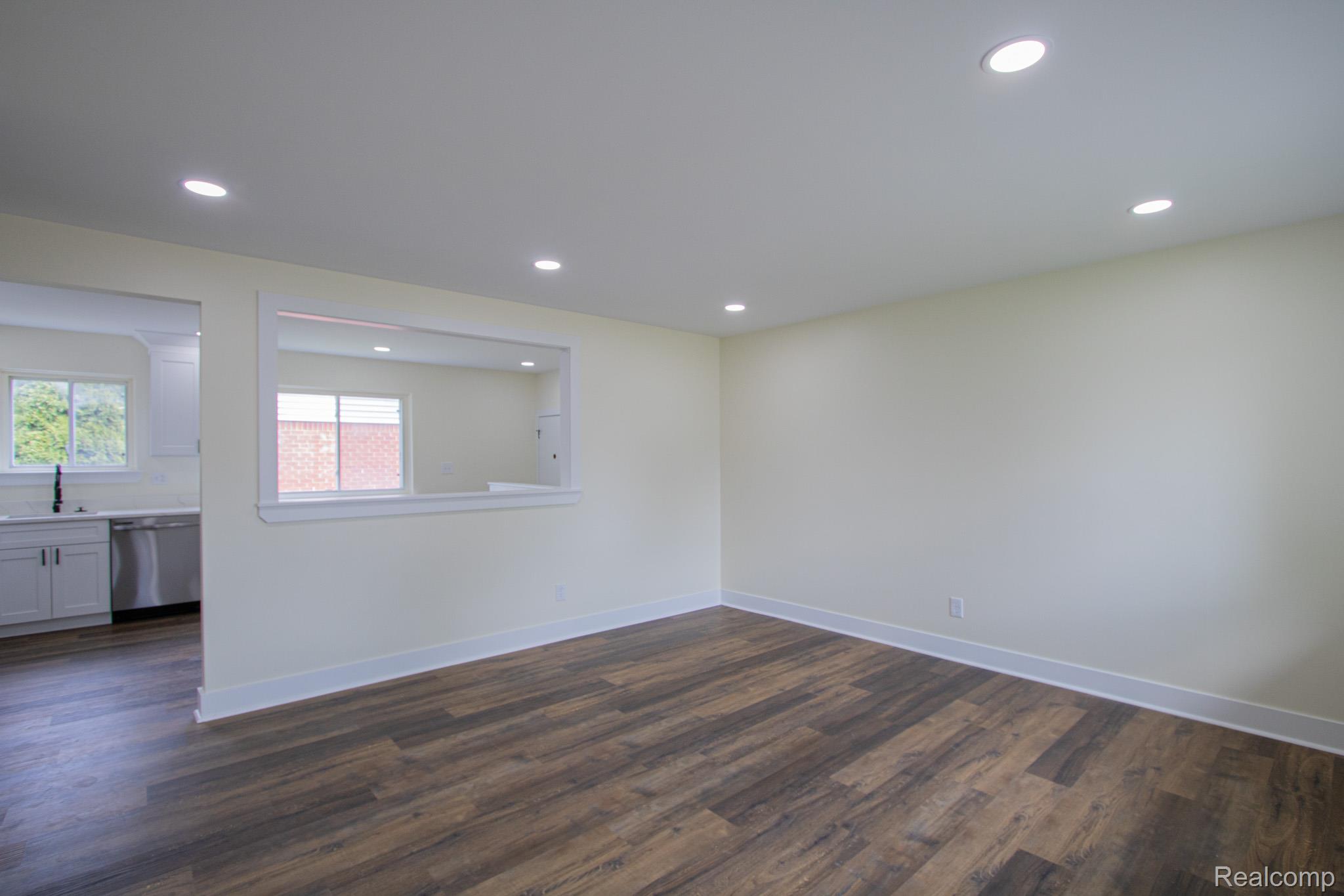 31000 Fall Fraser, MI 48026 - Photo 7 of 28 Empty room featuring dark wood finished floors and recessed lighting
