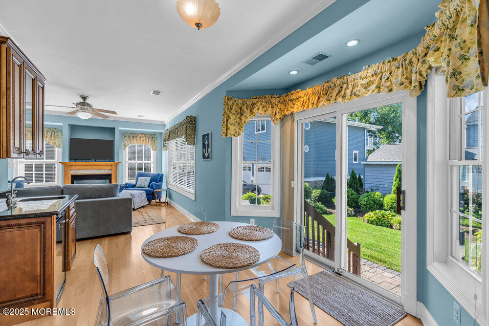 419 Central Avenue Spring Lake, NJ 07762 - Photo 16 of 41 a living room with fireplace furniture and a large window