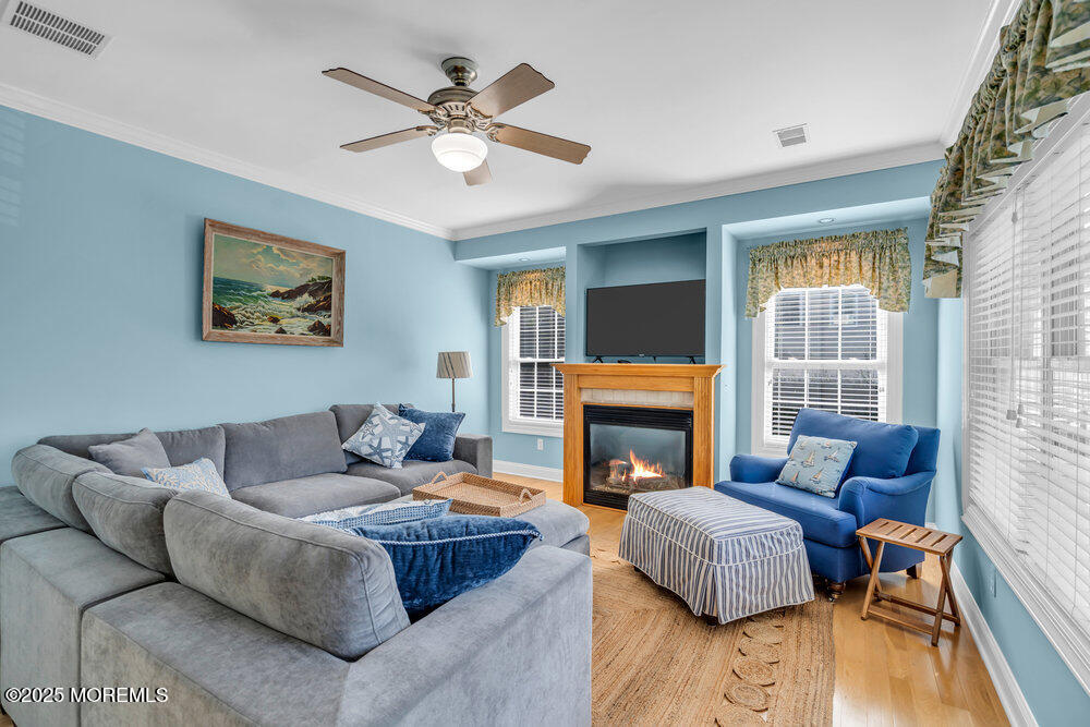 419 Central Avenue Spring Lake, NJ 07762 - Photo 19 of 41 a living room with furniture and a fireplace