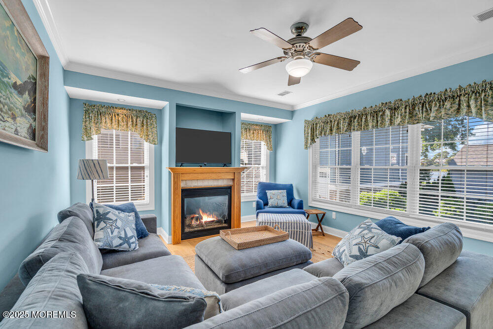 419 Central Avenue Spring Lake, NJ 07762 - Photo 20 of 41 a living room with furniture and a fireplace