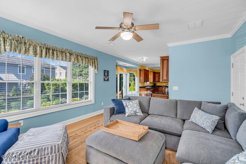 419 Central Avenue Spring Lake, NJ 07762 - Photo 21 of 41 a living room with furniture and a large window