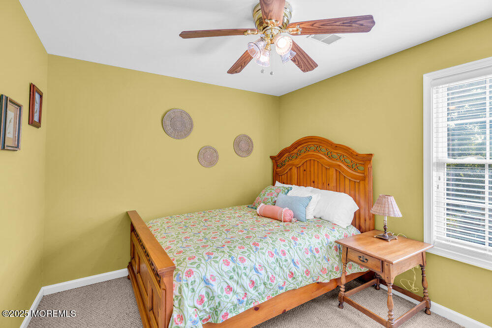 419 Central Avenue Spring Lake, NJ 07762 - Photo 24 of 41 a bedroom with a bed and a window