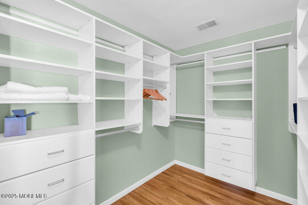 419 Central Avenue Spring Lake, NJ 07762 - Photo 34 of 41 a view of walk in closet with empty racks