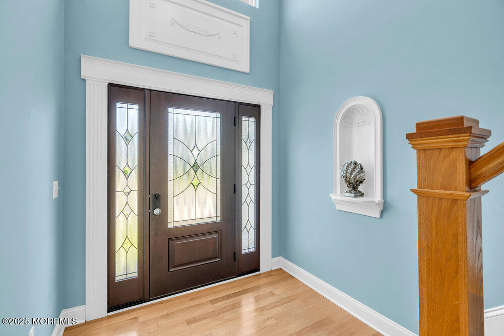 419 Central Avenue Spring Lake, NJ 07762 - Photo 4 of 41 a view of a room that has a bed and painted walls