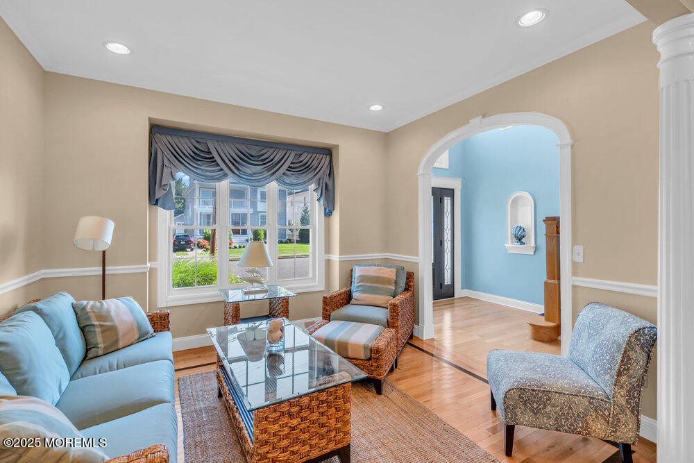 419 Central Avenue Spring Lake, NJ 07762 - Photo 8 of 41 a living room with furniture and a large window