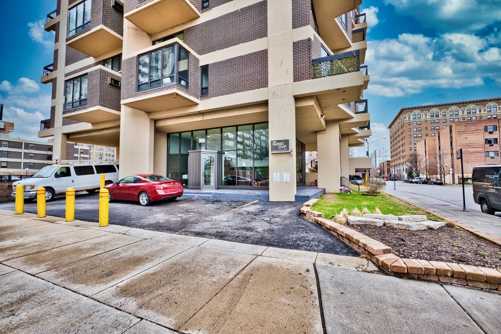 6166 North Sheridan Road, Unit 26A Chicago, IL 60660 - Photo 1 of 27 a view of a street with cars