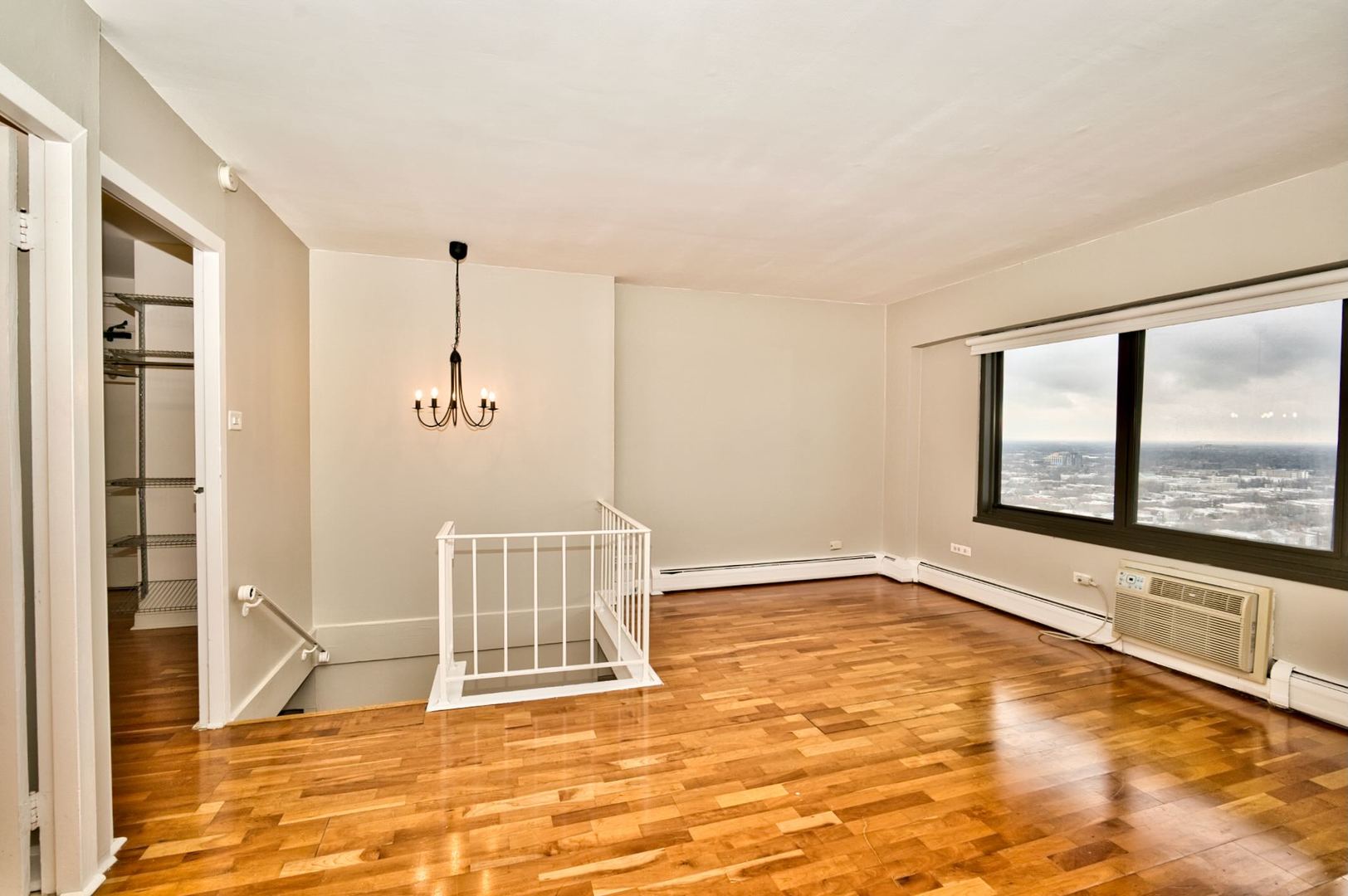 6166 North Sheridan Road, Unit 26A Chicago, IL 60660 - Photo 18 of 27 a view of an empty room with a window