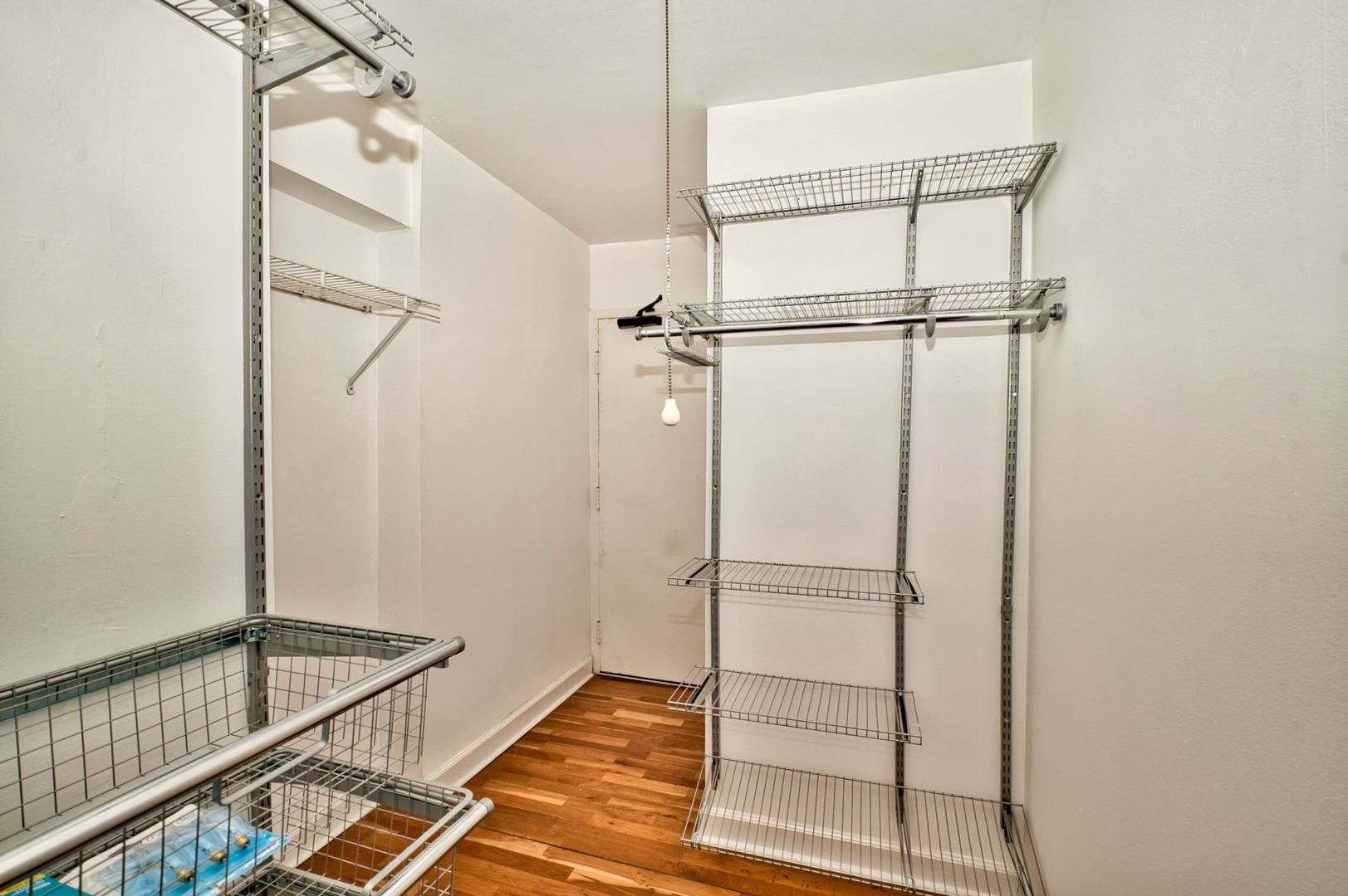 6166 North Sheridan Road, Unit 26A Chicago, IL 60660 - Photo 23 of 27 a view of an empty walk in closet