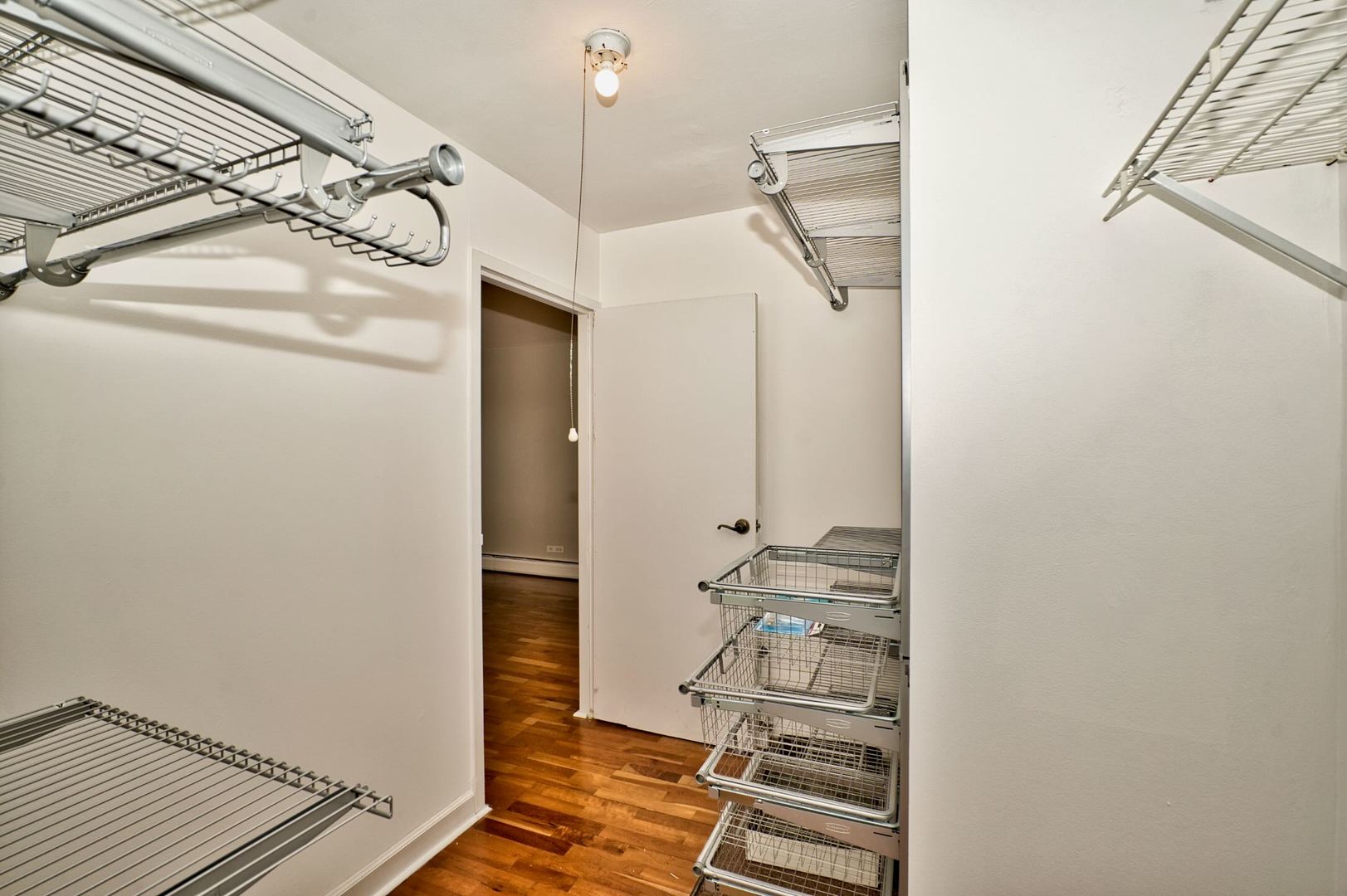 6166 North Sheridan Road, Unit 26A Chicago, IL 60660 - Photo 24 of 27 a bathroom with a shower and a sink