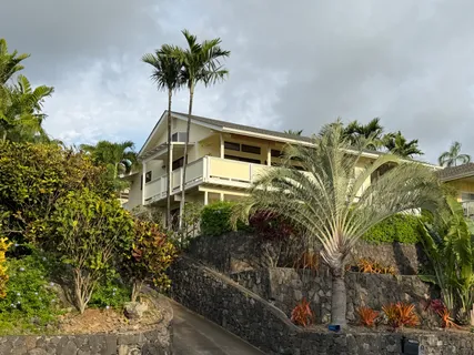 a view of a balcony with staircase