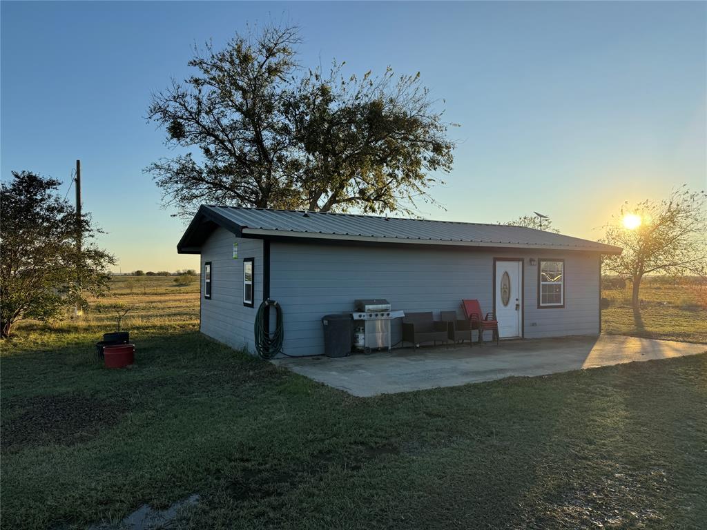 386 County Road 604 Hamilton, TX 76531 - Photo 2 of 20 a house view with a garden space