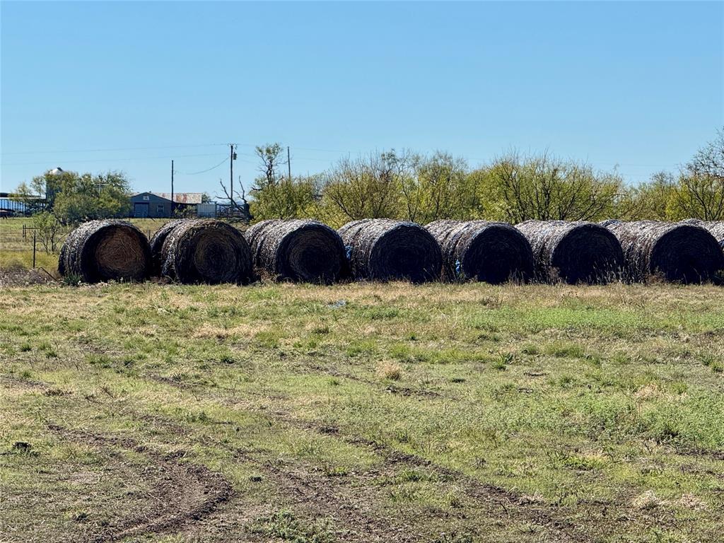 386 County Road 604 Hamilton, TX 76531 - Photo 8 of 20 a view of a street with an outdoor space