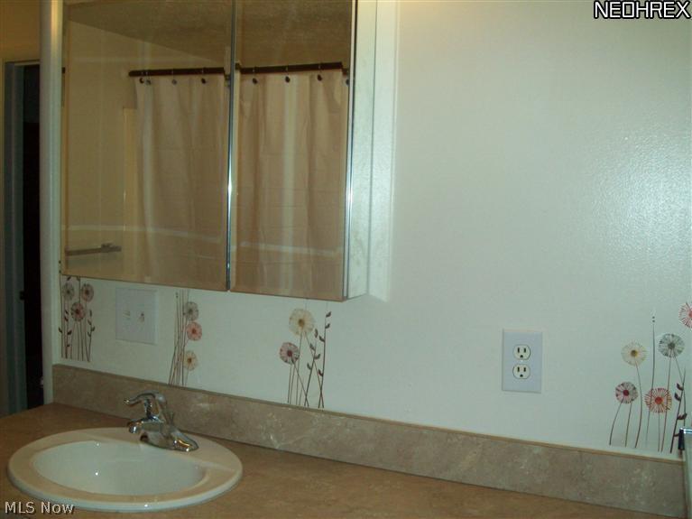 9956 Johnnycake Ridge Road, Unit L3 Painesville, OH 44077 - Photo 9 of 15 Cute restroom