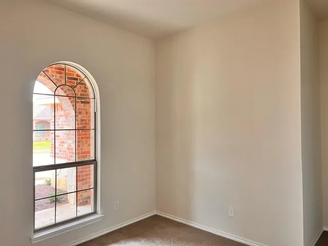a view of a livingroom with a flat screen tv