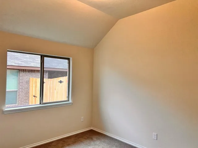 a view of a small space with a window