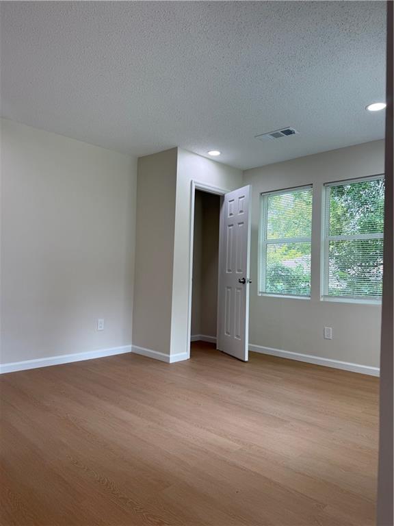 3319 Decatur Street Columbus, GA 31906 - Photo 8 of 18 an empty room with windows