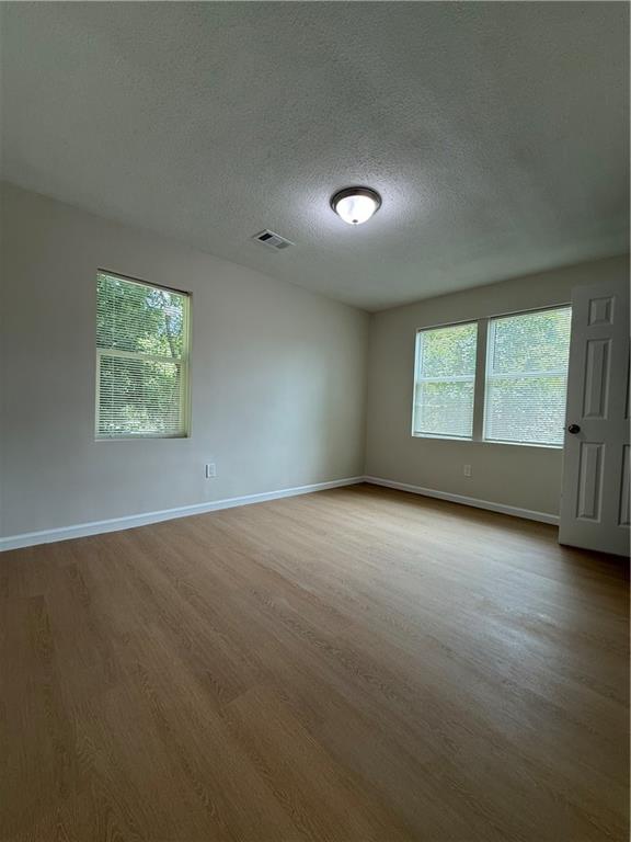 3319 Decatur Street Columbus, GA 31906 - Photo 10 of 18 an empty room with windows