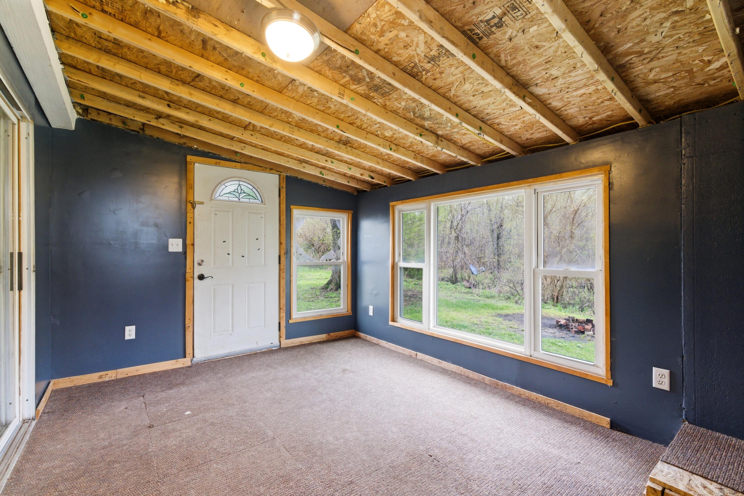 17333 North 700th Street West Hebron, IN 46341 - Photo 23 of 35 a view of an empty room with a balcony