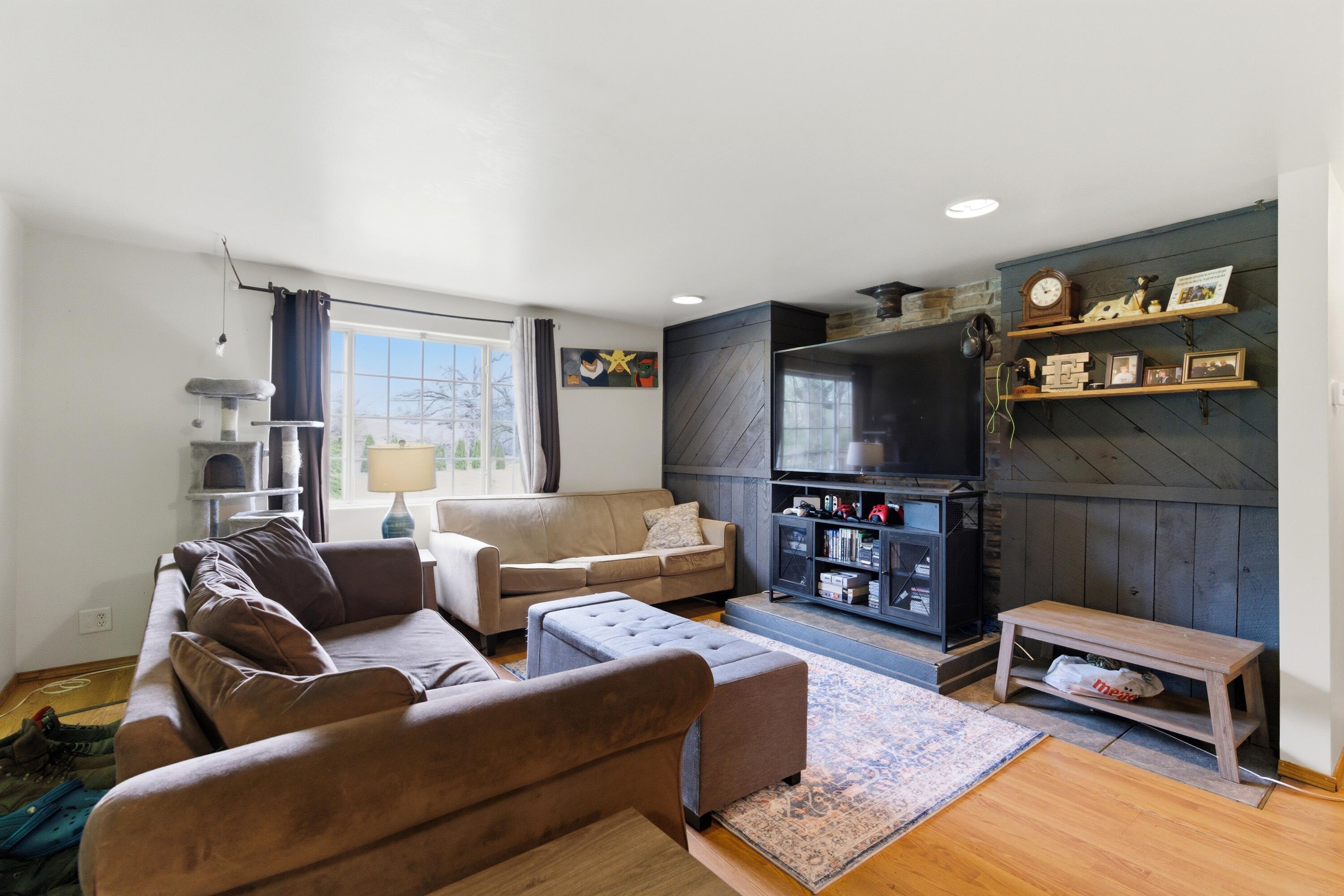17333 North 700th Street West Hebron, IN 46341 - Photo 3 of 35 a living room with furniture and a flat screen tv