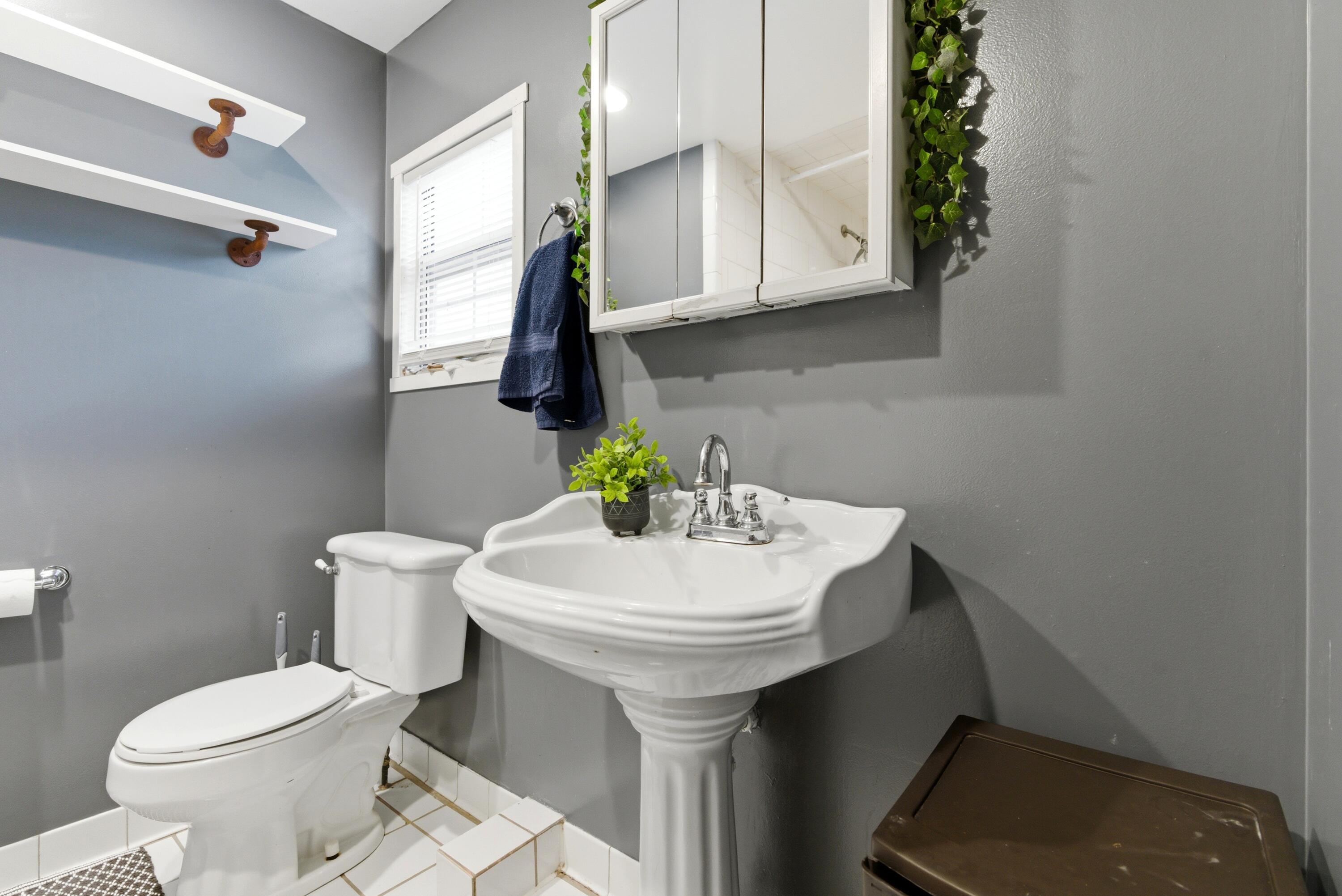 17333 North 700th Street West Hebron, IN 46341 - Photo 10 of 35 a bathroom with a sink toilet and a mirror