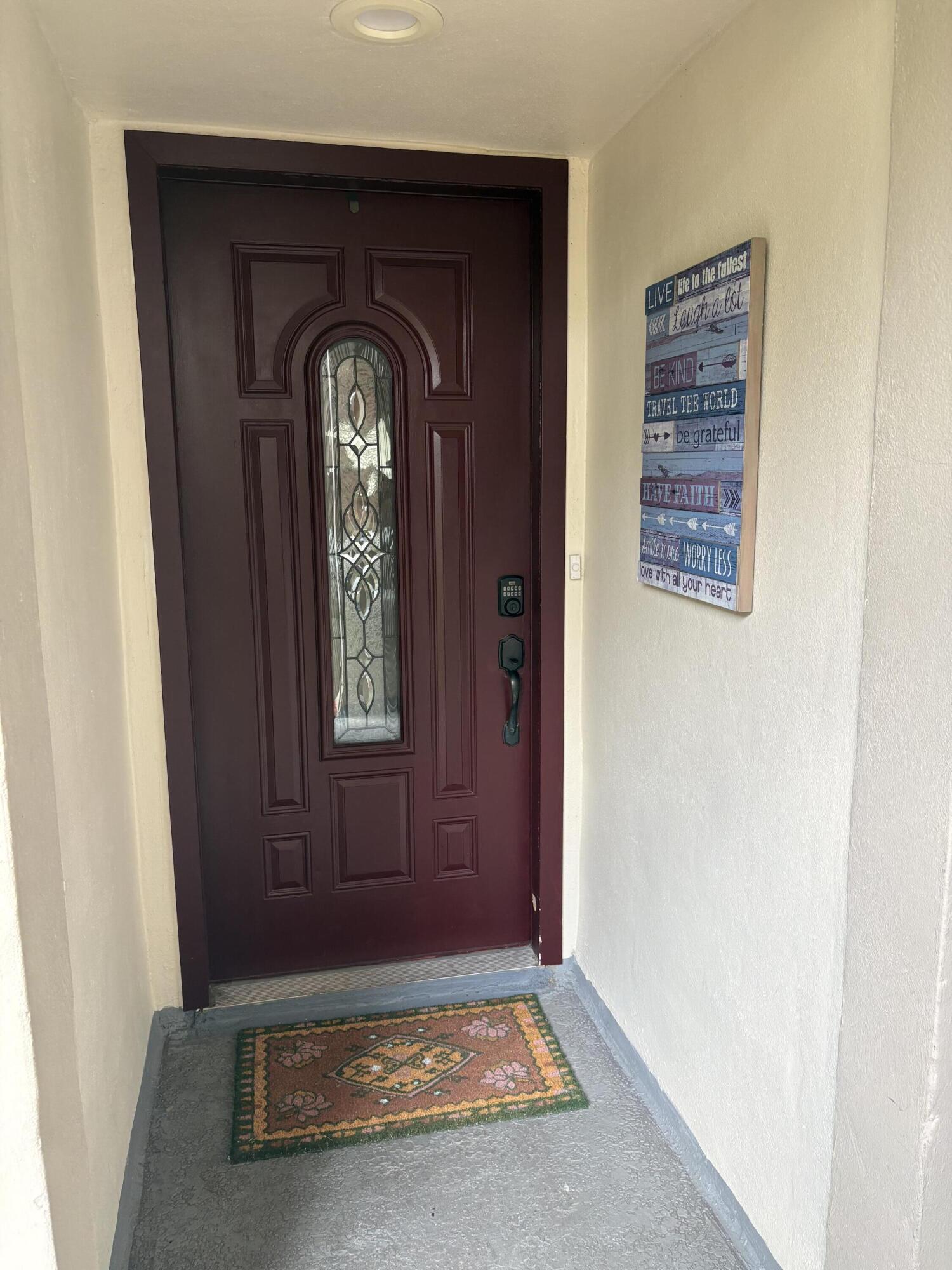 157 Capri East Delray Beach, FL 33484 - Photo 2 of 20 a view of an entryway door