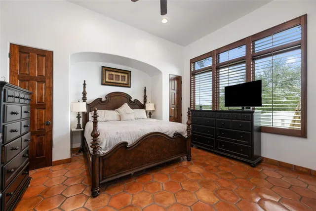 a view of balcony with furniture