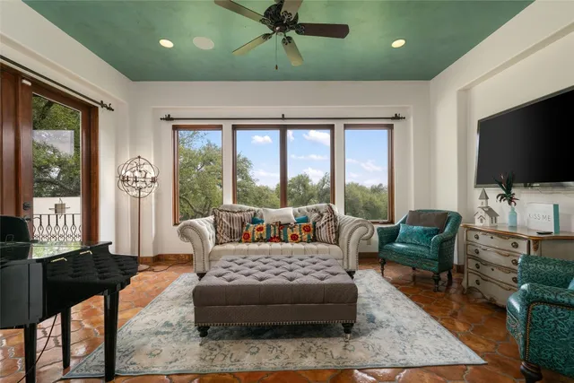 a view of a livingroom with walk in closet and bathroom