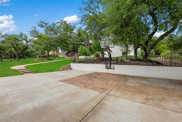 a view of a house with a big yard