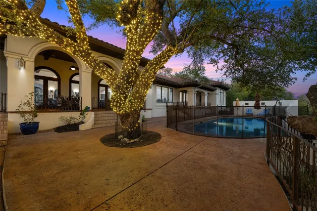 a bathroom with a toilet and shower