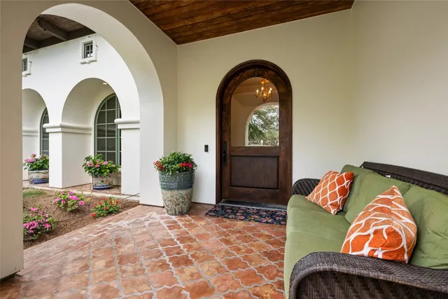an aerial view of a house with a lake view