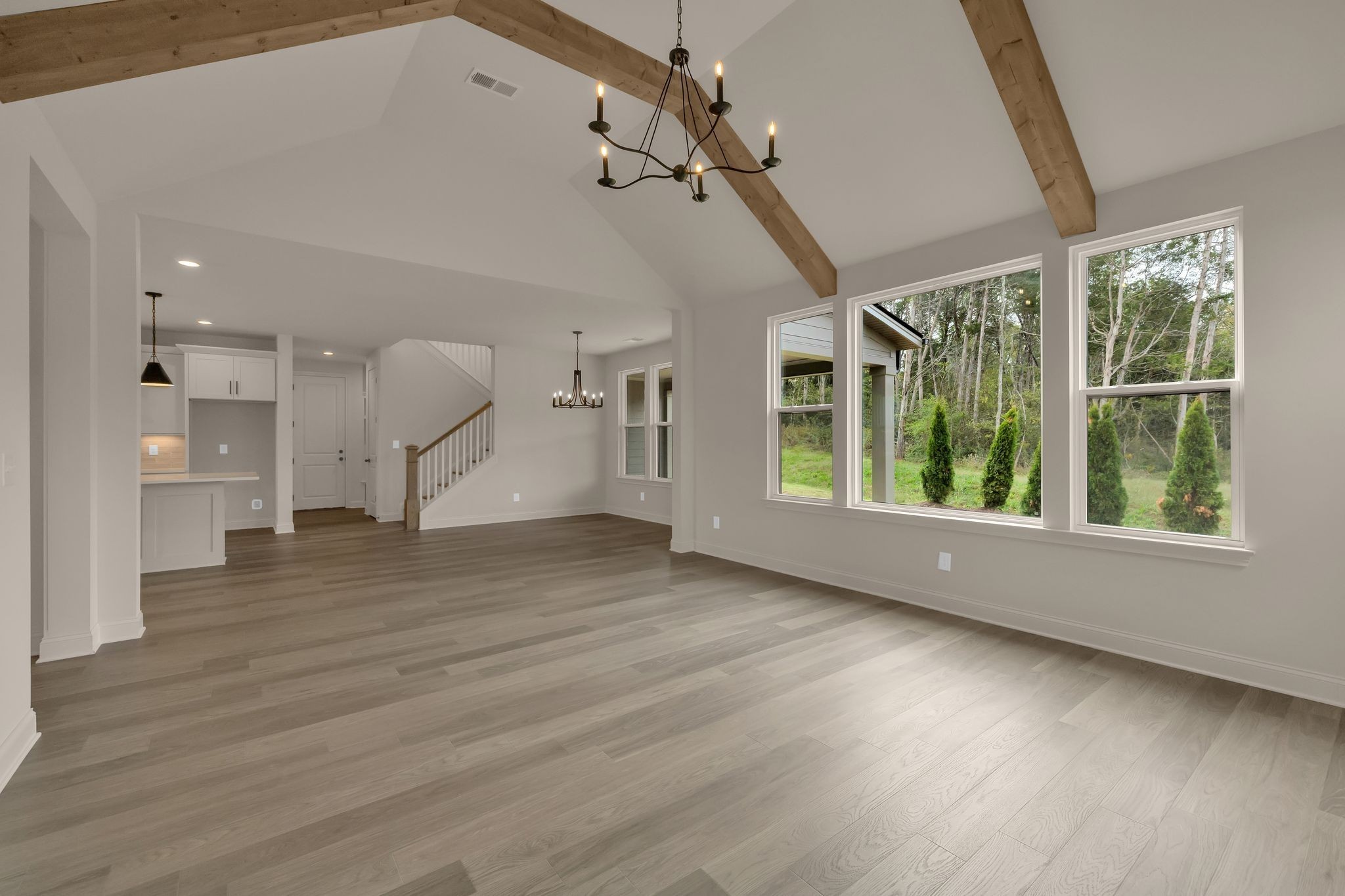 7321 Winners Road Murfreesboro, TN 37129 - Photo 13 of 41 a view of an empty room with wooden floor and a window