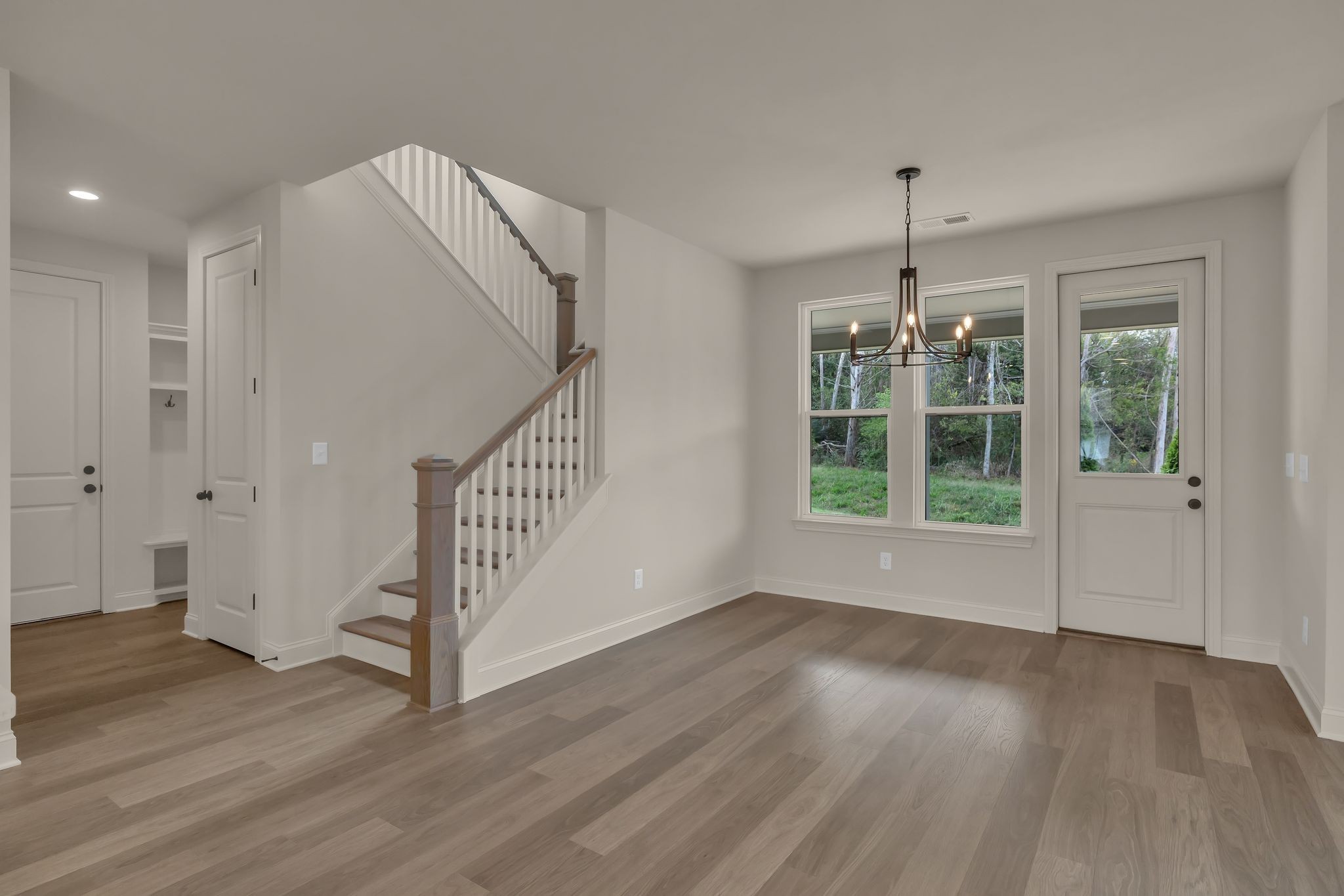 7321 Winners Road Murfreesboro, TN 37129 - Photo 19 of 41 a view of empty room with wooden floor and fan